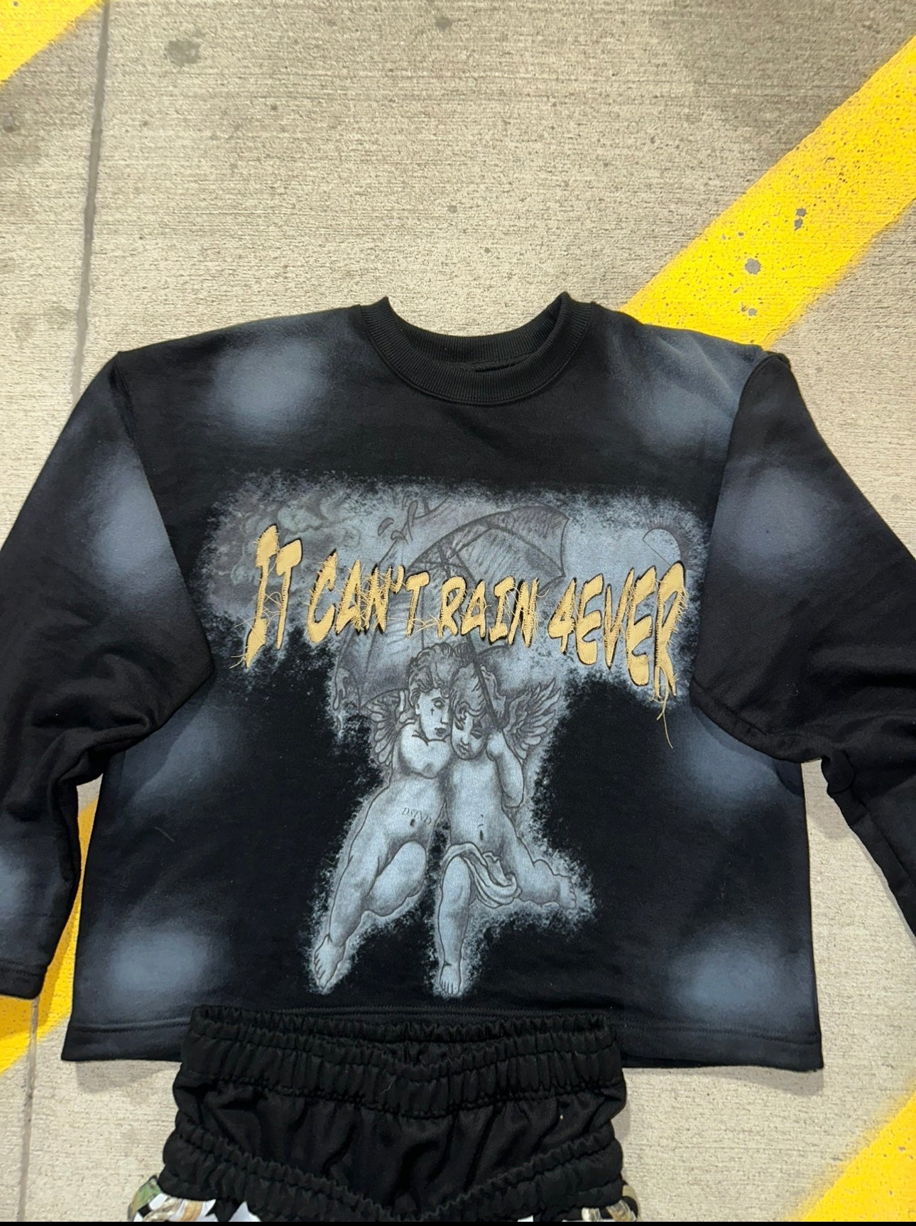 It can’t rain 4ever sweater